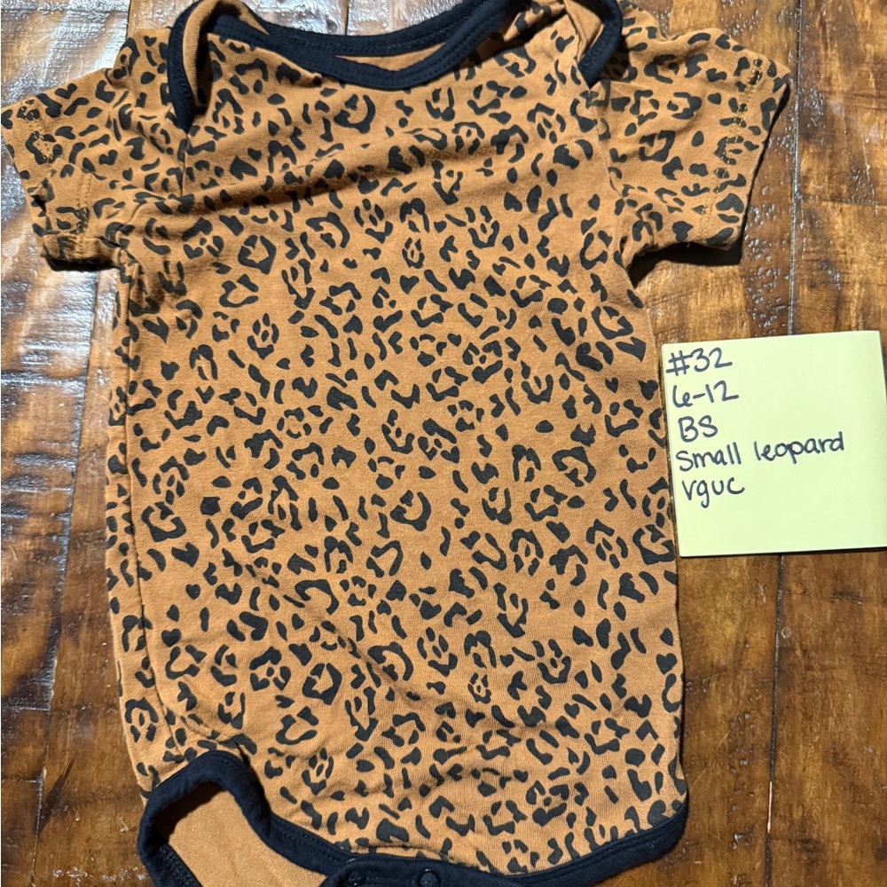 Kyte BABY Leopard Print Bodysuit with Black Trim